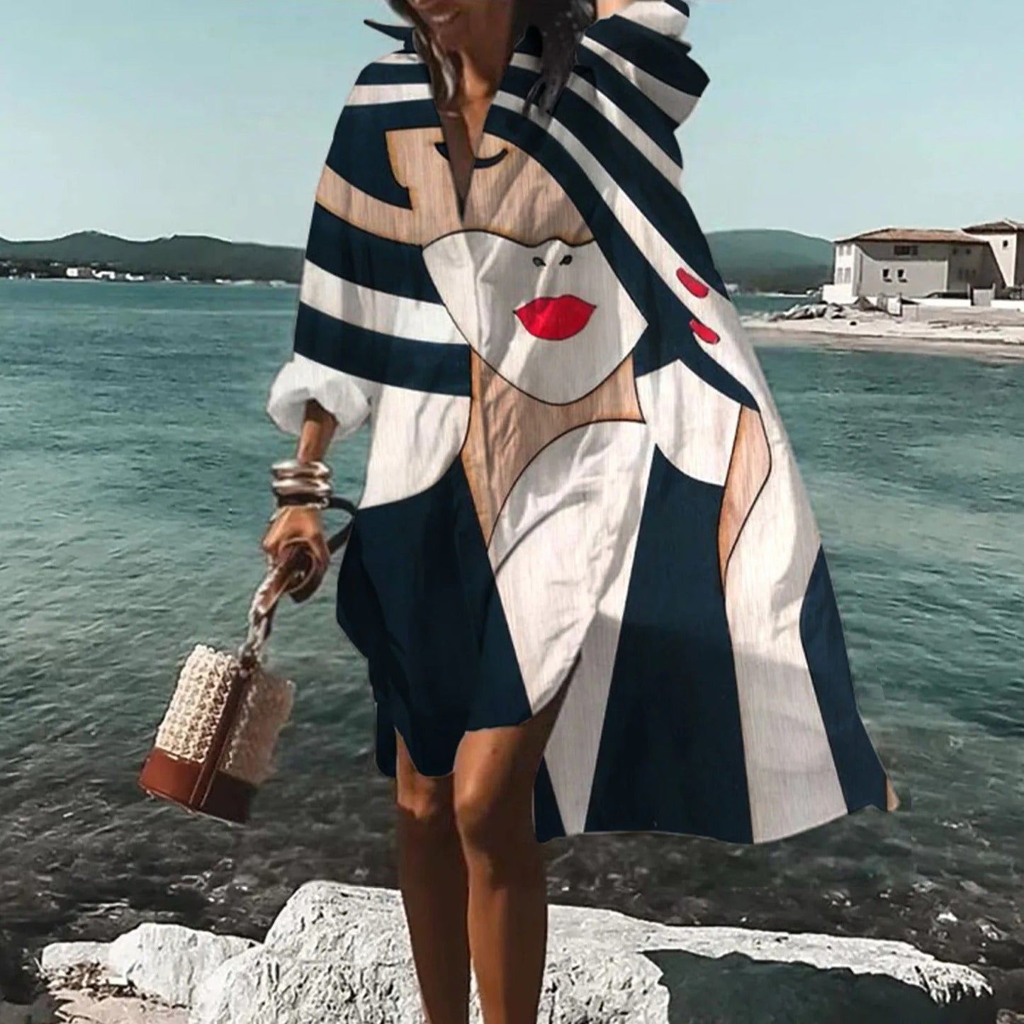 Navy and white beach mini shirt dress with bold face graphic print and oversized shirt style